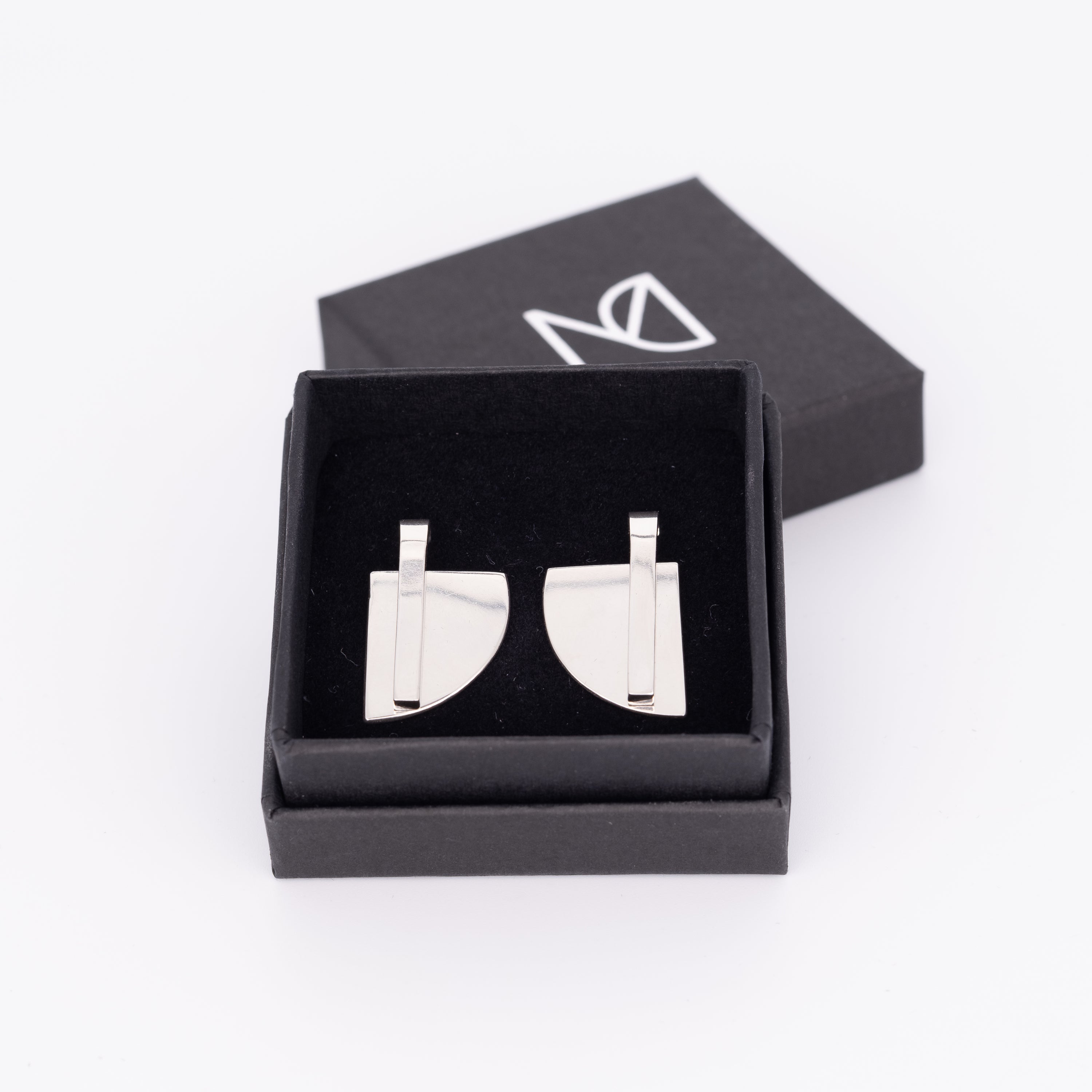 silver earrings in box