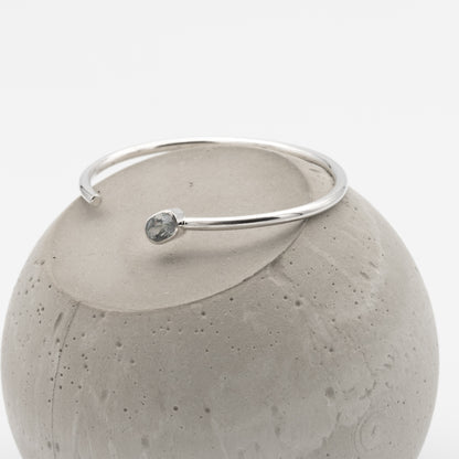 silver bangle with amystic topaz stone