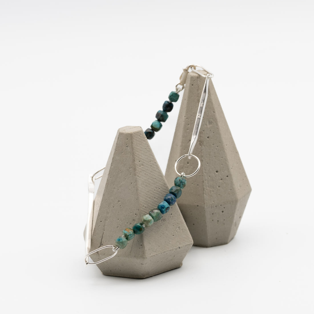 Jewelry with blue beads on a white background