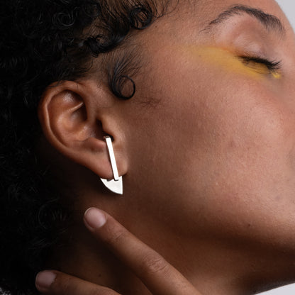 silver designer earrings with ear jacket