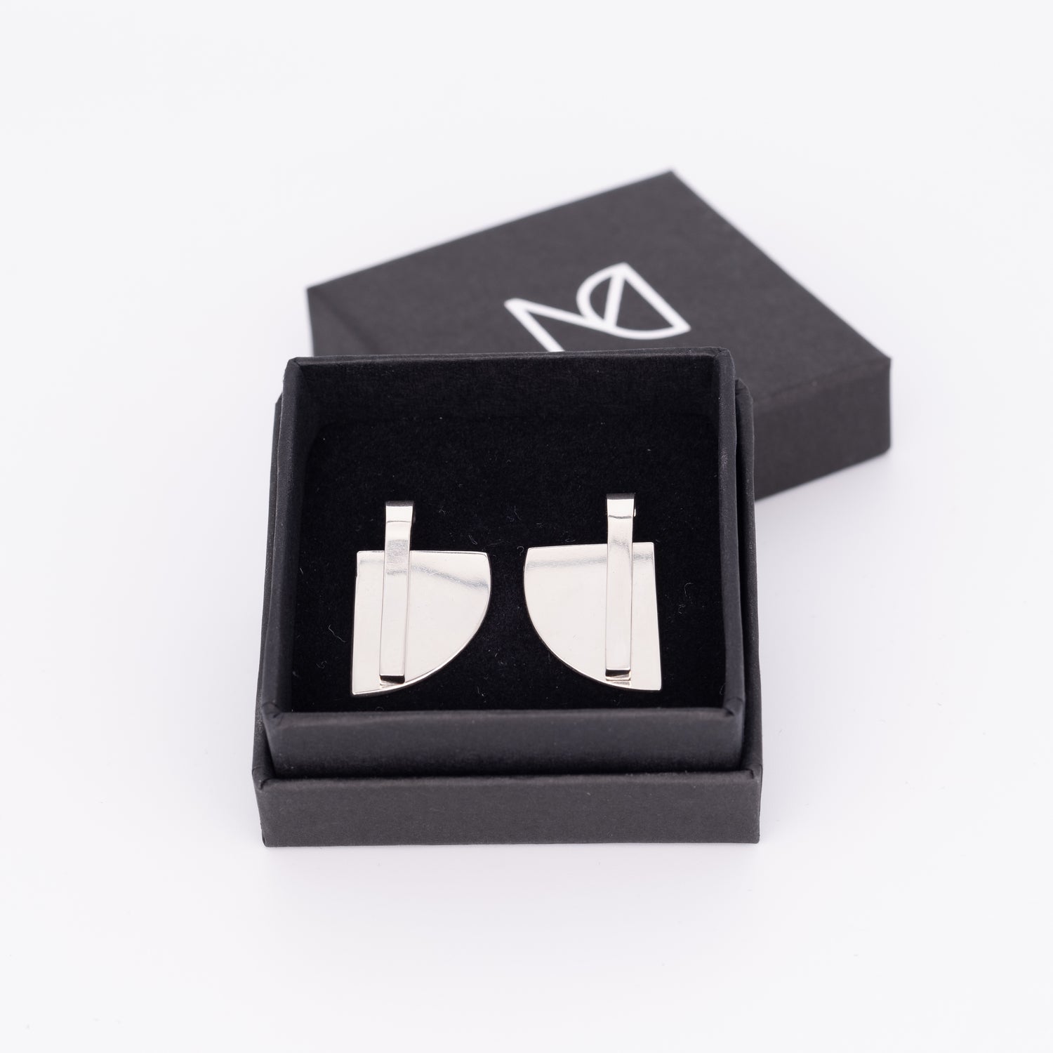silver earrings in box
