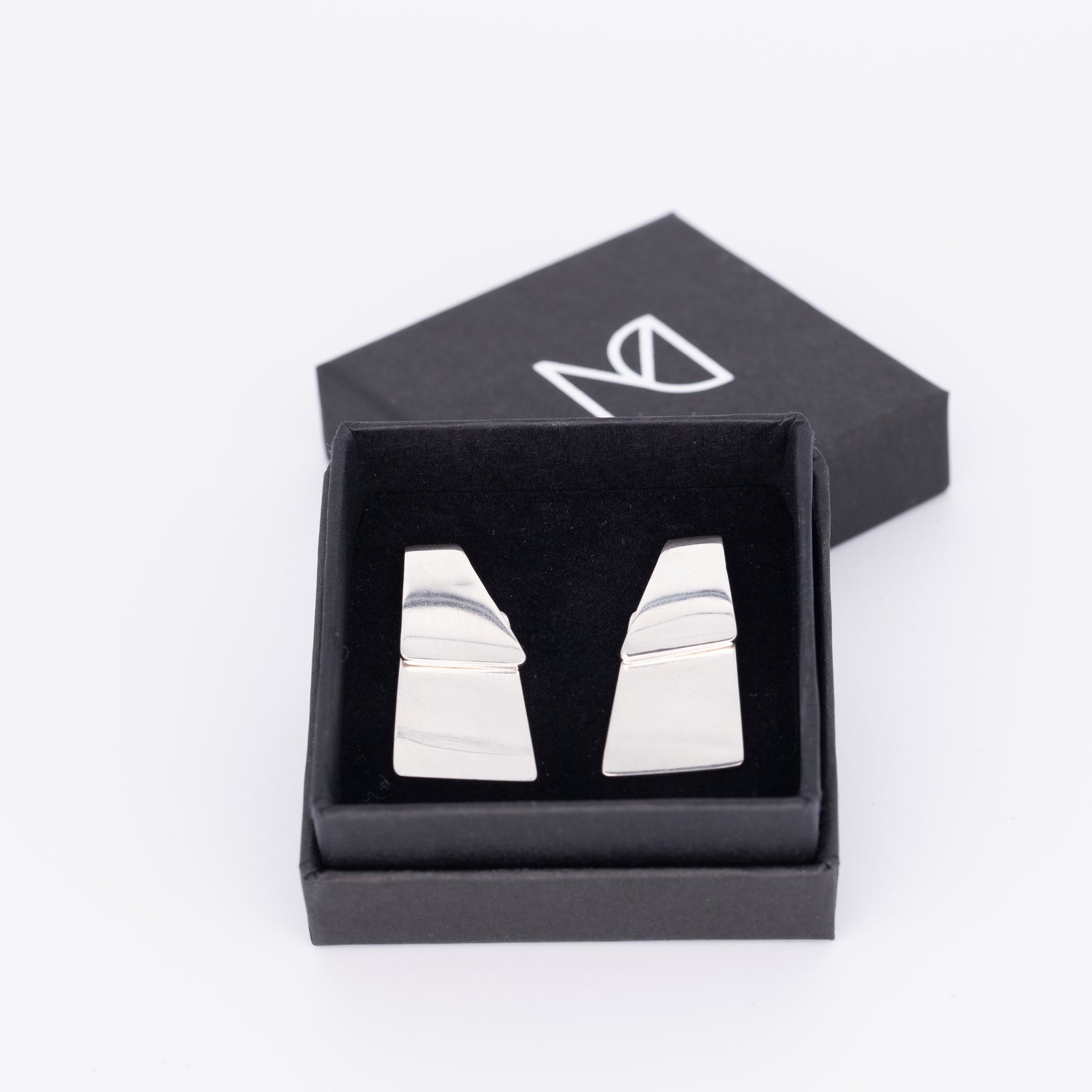 silver earrings in box