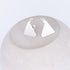 Pair of silver triangle earrings on a textured white surface