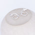Silver earrings ^twisting