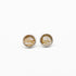 Round silver earrings with a natural stone design on a white background